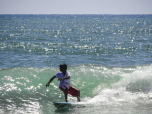 Surfing at Kovalam Beach