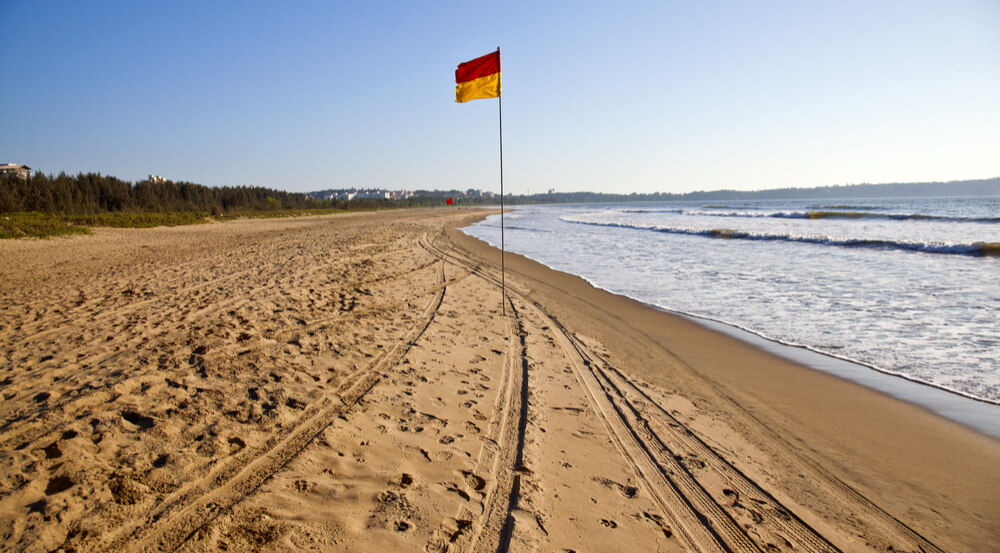 Flag on the beach, Miramar Beach, Panjim, Goa, India