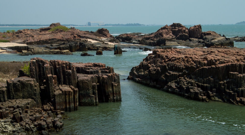 Landscape of St. Mary's island in Mangalore, India with basaltic columnar geological texture